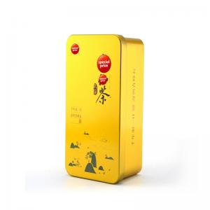 Prostokątna, złota metalowa puszka z herbatą