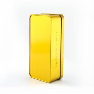 Prostokątna, złota metalowa puszka z herbatą