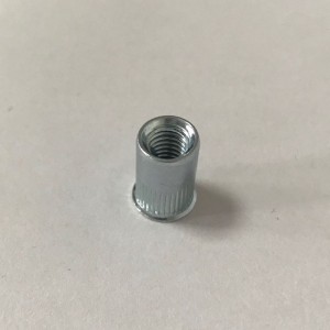 nakrętka nitowana zagięta