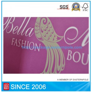 Purpurowa papierowa torba z wiązaną rączką