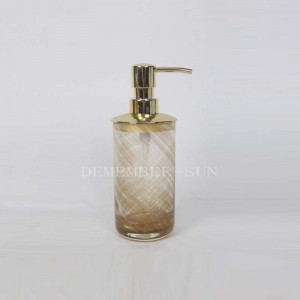 szklany zestaw akcesoriów łazienkowych z metalową pompką